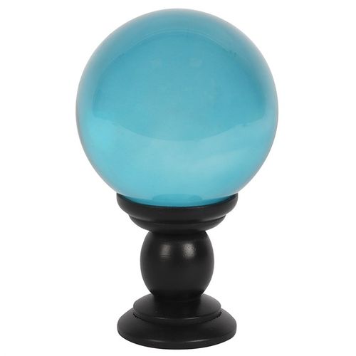 This enchanting large teal crystal ball, resting on a sleek black wooden stand, serves as a mystical focal point for divination and scrying. Its deep blue hues captivate the eye, making it a striking addition to any altar or Halloween display. Perfect for those drawn to the arcane, this crystal ball invites secrets and stories to unfold. Dimensions: 20cm tall, 13cm wide and deep. Handle with care and avoid direct sunlight to preserve its magical glow.