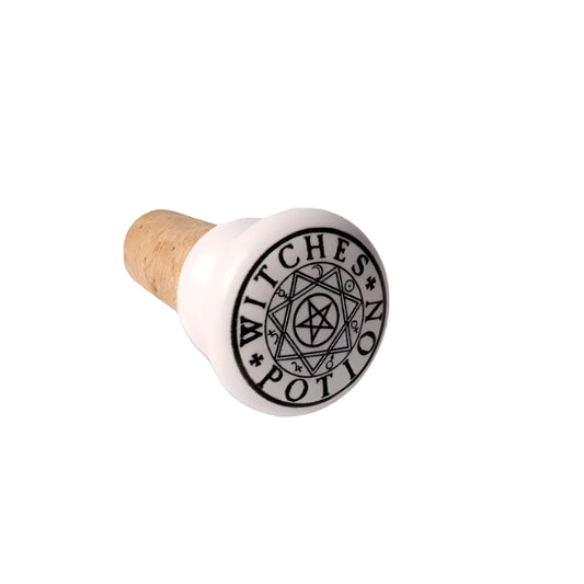 Dare you drink the Witches Potion?

Unleash your inner alchemist with this beautifully crafted bottle stopper, adorned with original artwork by Alchemy Gothic. Whether sealing your favourite wine or gifting a touch of magic to a fellow witch or wizard, this unique piece casts a spell on any gathering.

Part of Alchemy's exclusive gift and homeware range, this bottle stopper is one of 9 collectible designs, each brimming with gothic charm and mystique. A must-have for lovers of fantasy, gothic décor, and enc