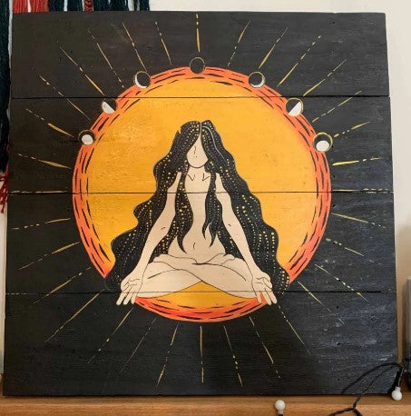 This stunning wall decoration features a bold and striking design of a meditating yoga figure, set against the various moon phases. &nbsp;This unique wall plaque has been hand painted in bold colours and comes with a string for quick and easy hanging.